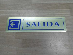 cartel salida adhesivo 16.5x4.5cm